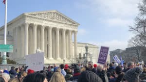 Large pro-life crowd peacefully protesting in front of the U.S. Supreme Court
