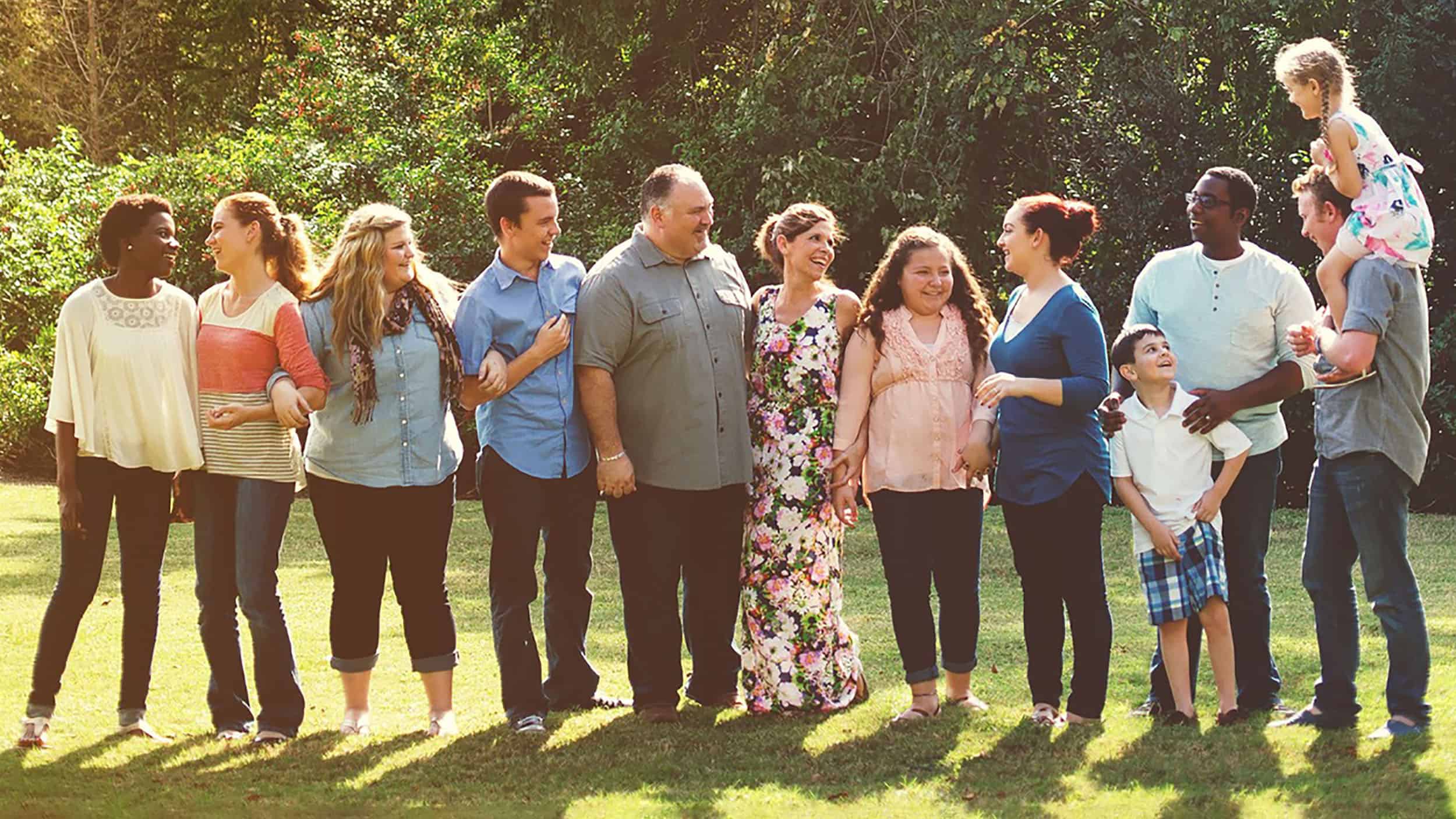 Chris and Alicia Johnson (center) and their family, also know as the #JohnsonDozen.