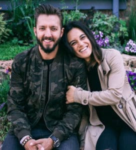 Levi and Jennie Lusko smiling, posing together for a photo