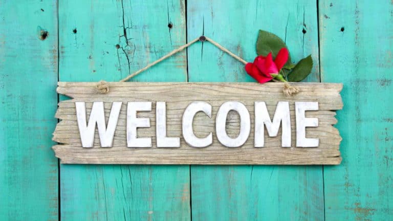 A welcome sign on a door
