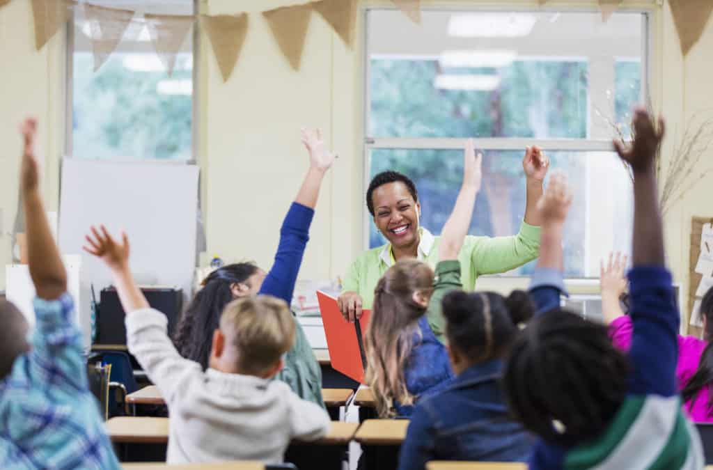 mom teaching kids in foster care