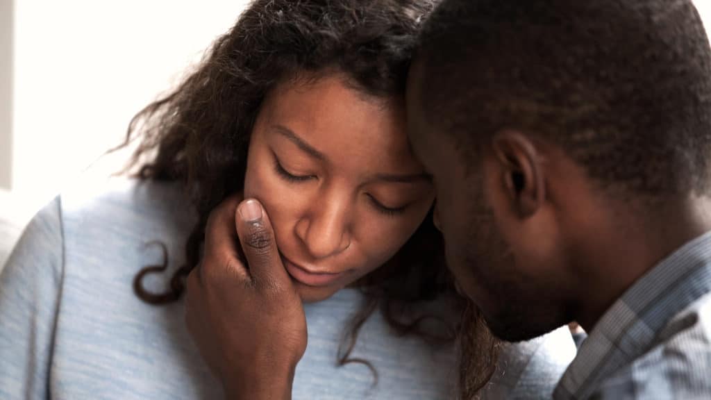 Husband loving wife after a miscarriage
