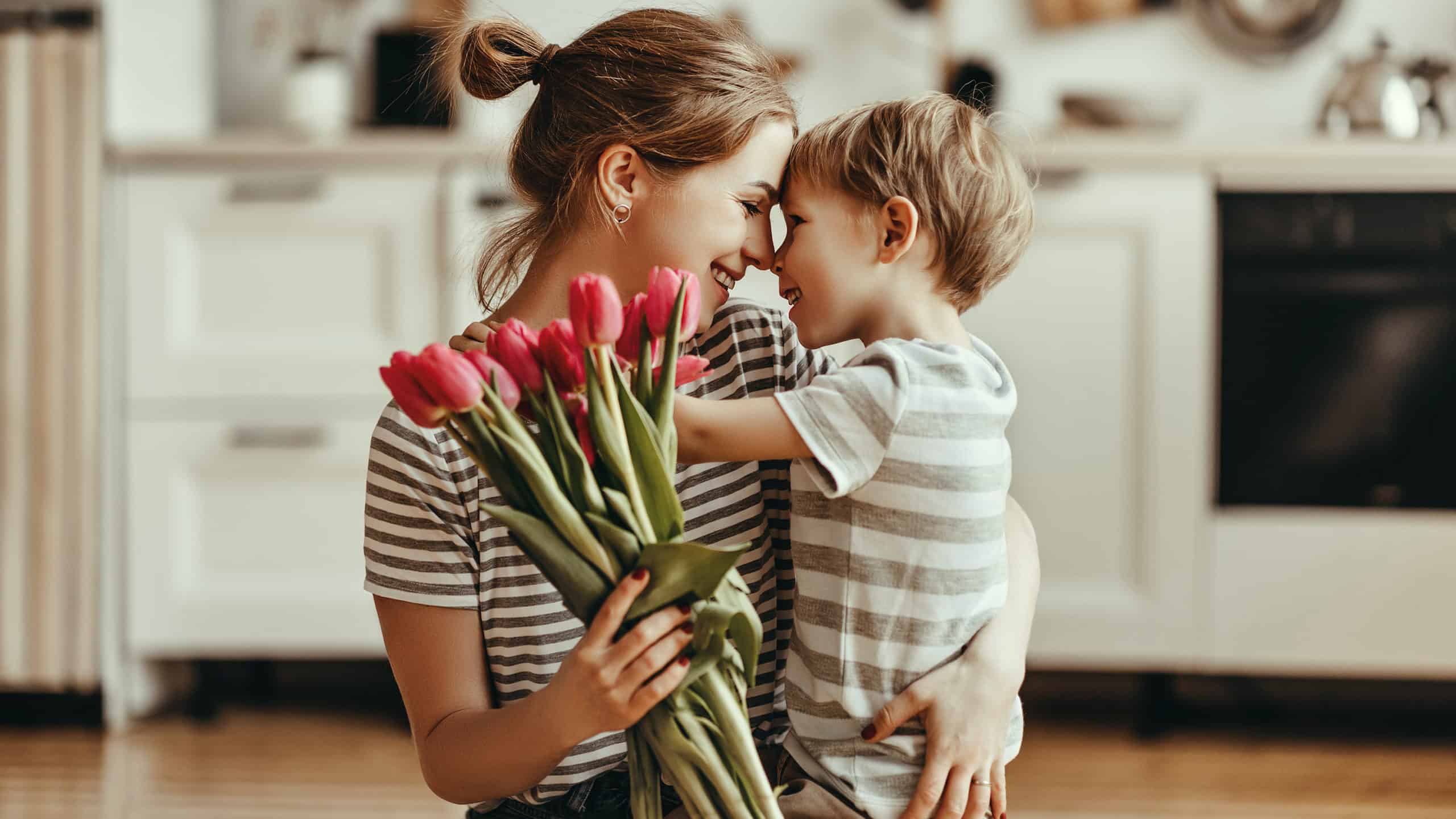 Mother and son with flowers on Mother's Day