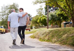 dad and son walking father's day