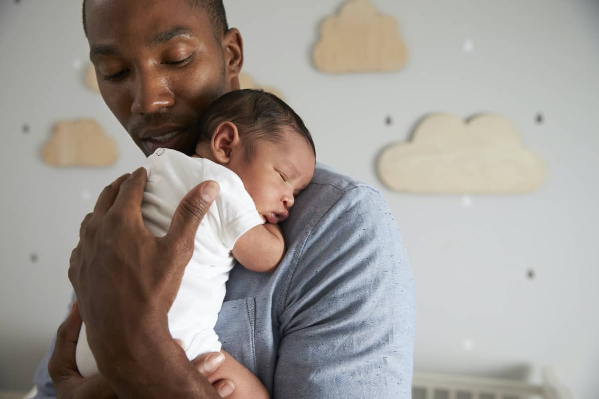 Pro-life man holding a baby