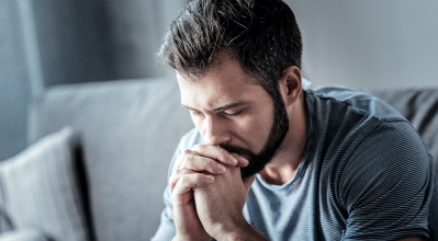 a pro-life man in gray shirt thinks and prays about how to be involved in the pro-life movement