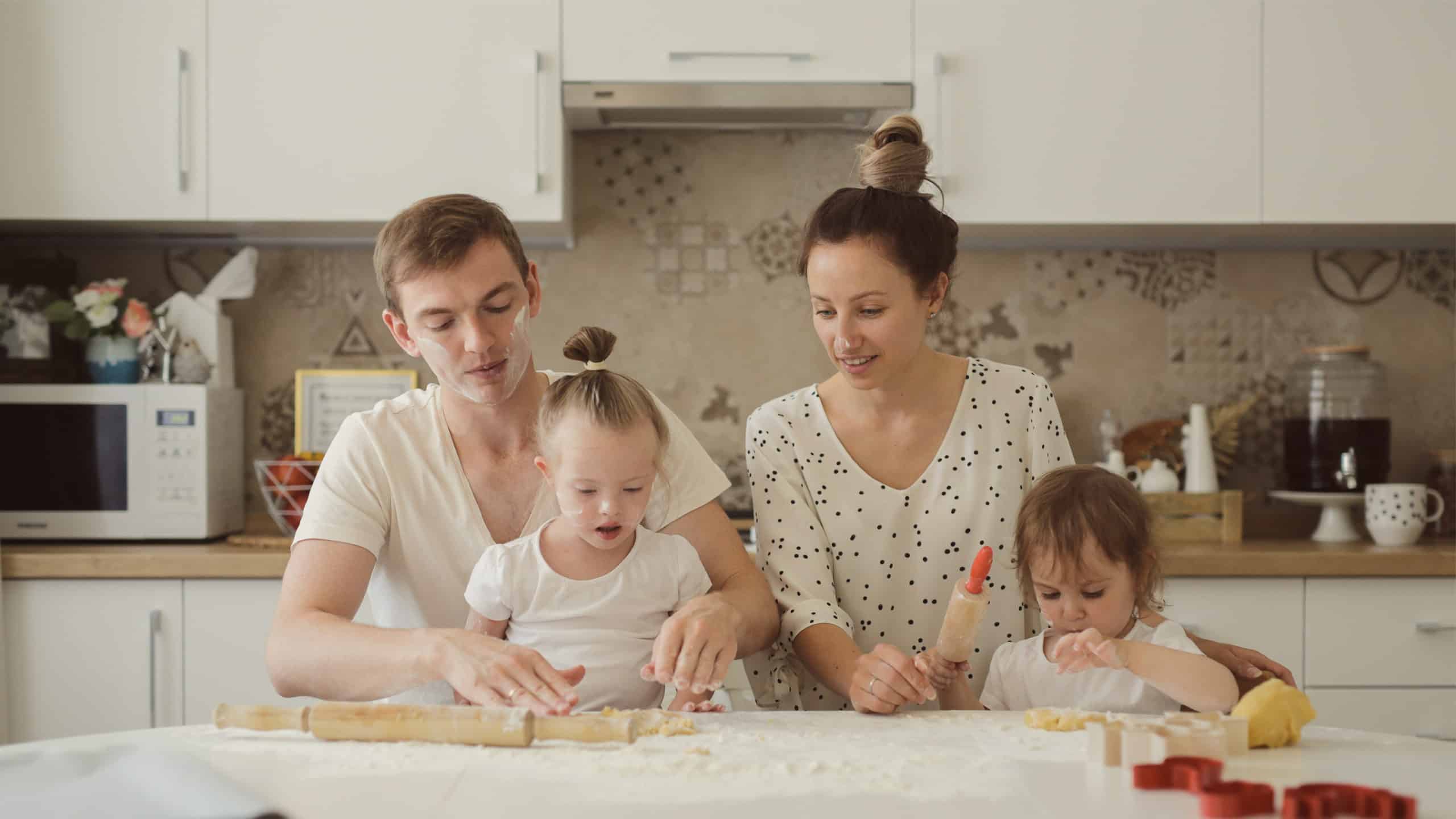 married-couple-down-syndrome-child-baking-cookies