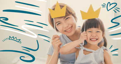 Mom and daughter holding crowns above their heads and being sure of their identity in Christ.