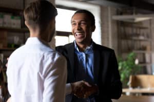 two men shaking hands