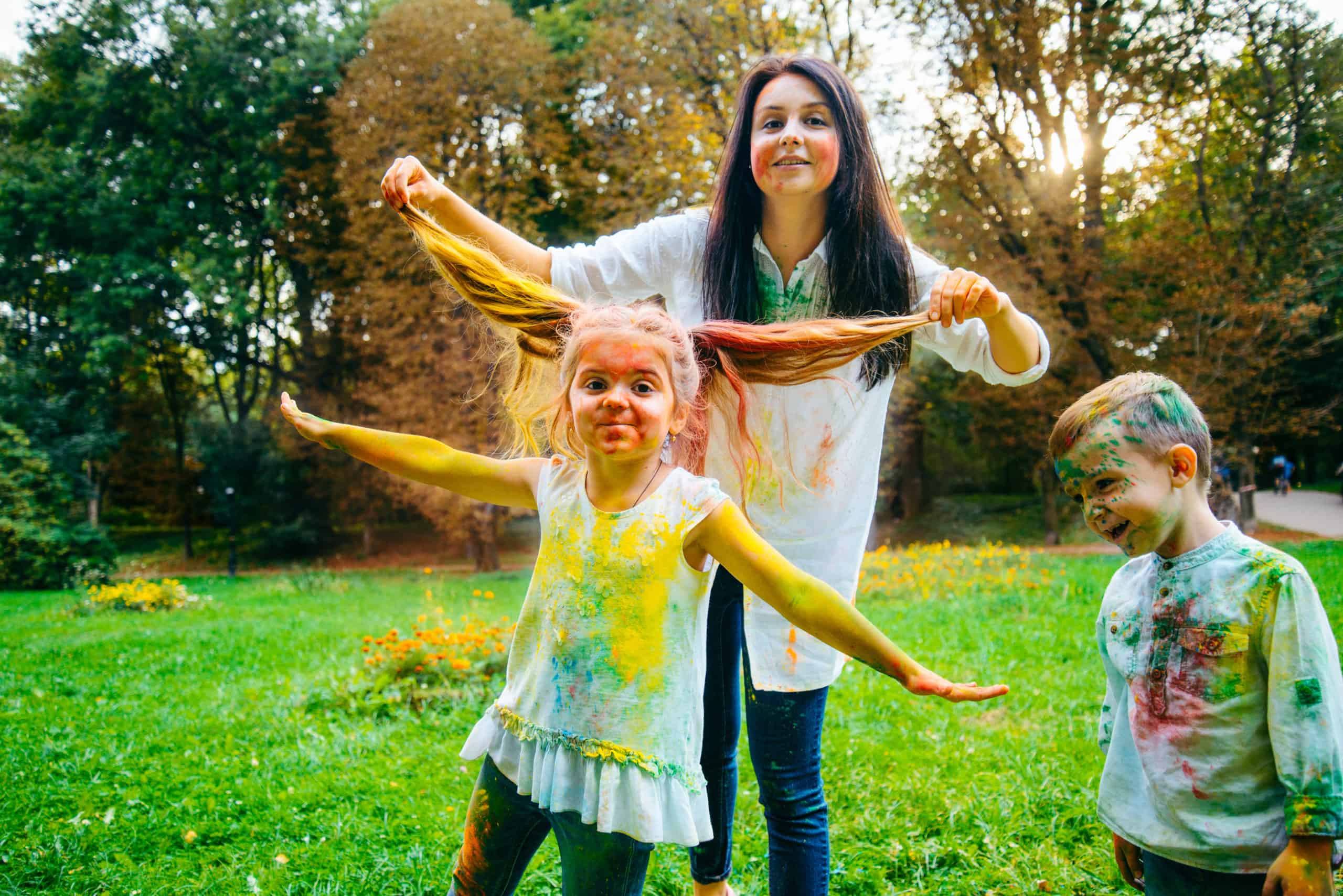 Messy Family Covered in Paint