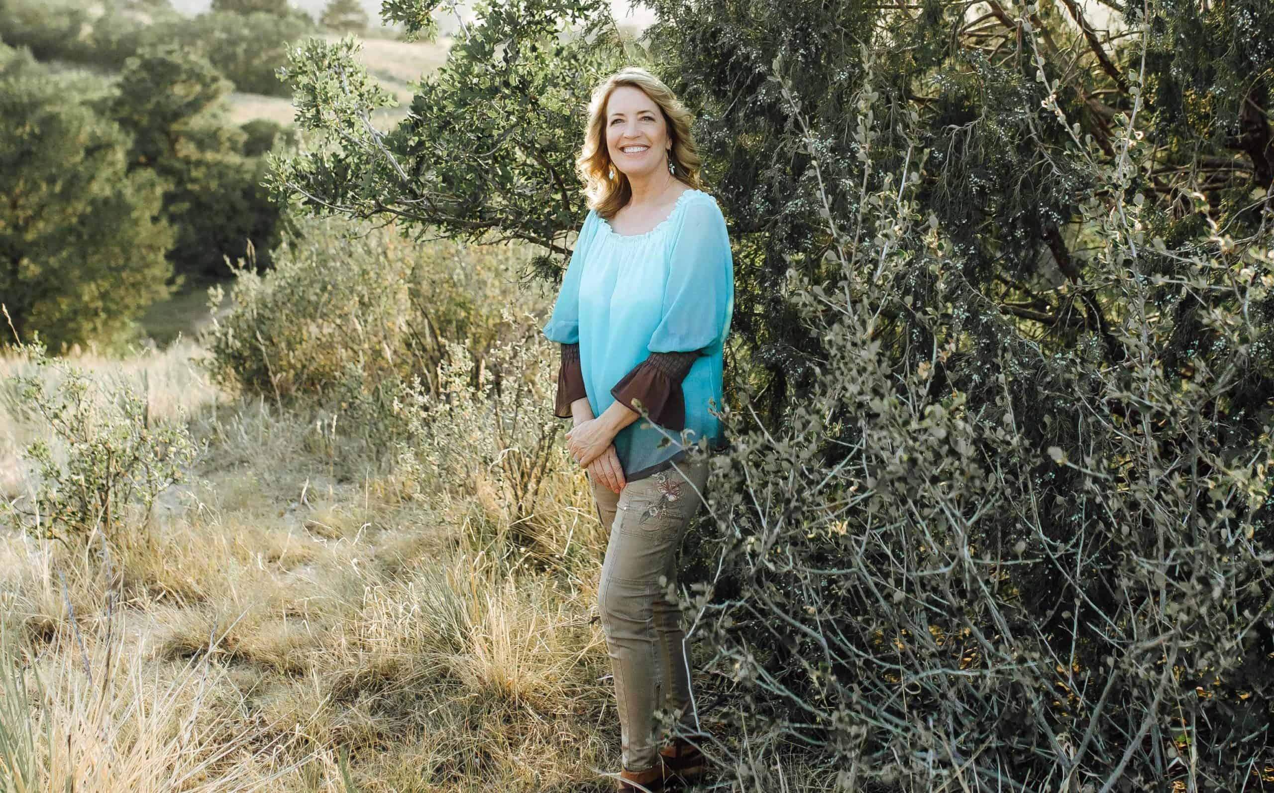 Lands of the Bible are detailed by Jean Daly, who is standing by a tree