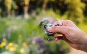 A fidget spinner used to help children in simple gestures of kindness