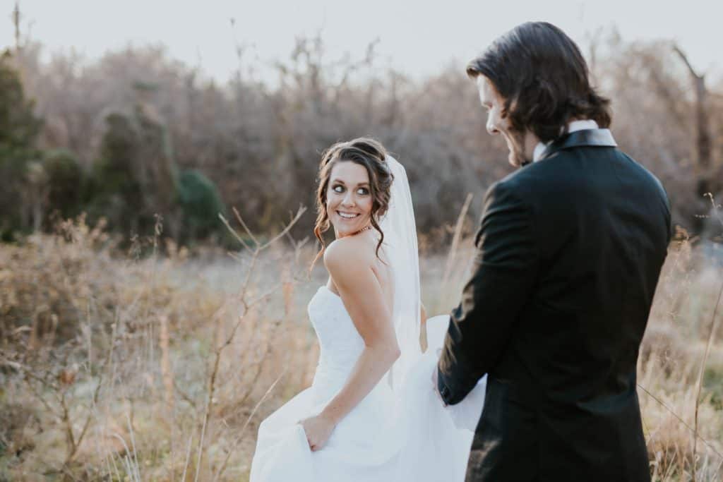 a married man and woman in a field