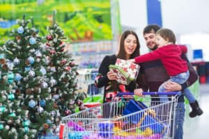 Family shopping for christmas toy donation