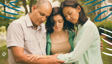 Family praying together