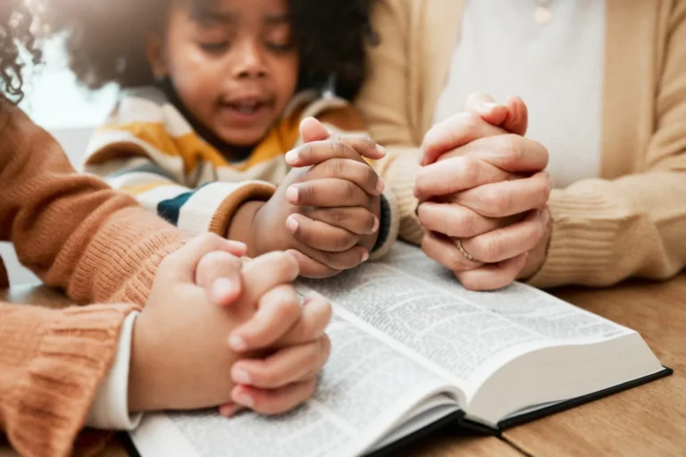 family praying together