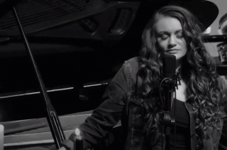 Still image of Kourtney Rea Chapman from her YouTube music video