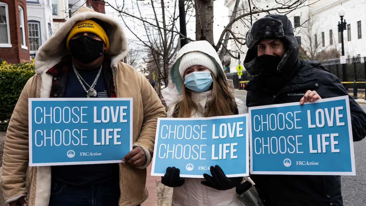The pro-life generation Z holds pro-life signs at the March for Life.