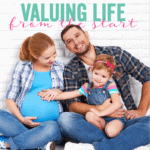 Image of family with little child excited by pregnant mom
