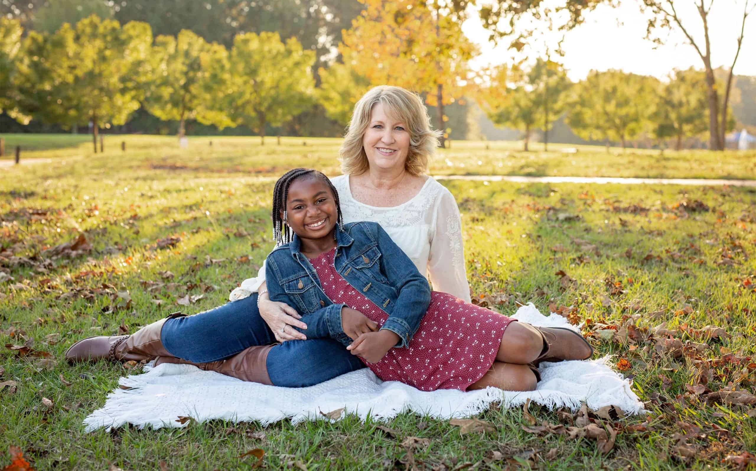 A photo of Lori and Natalie in a park.