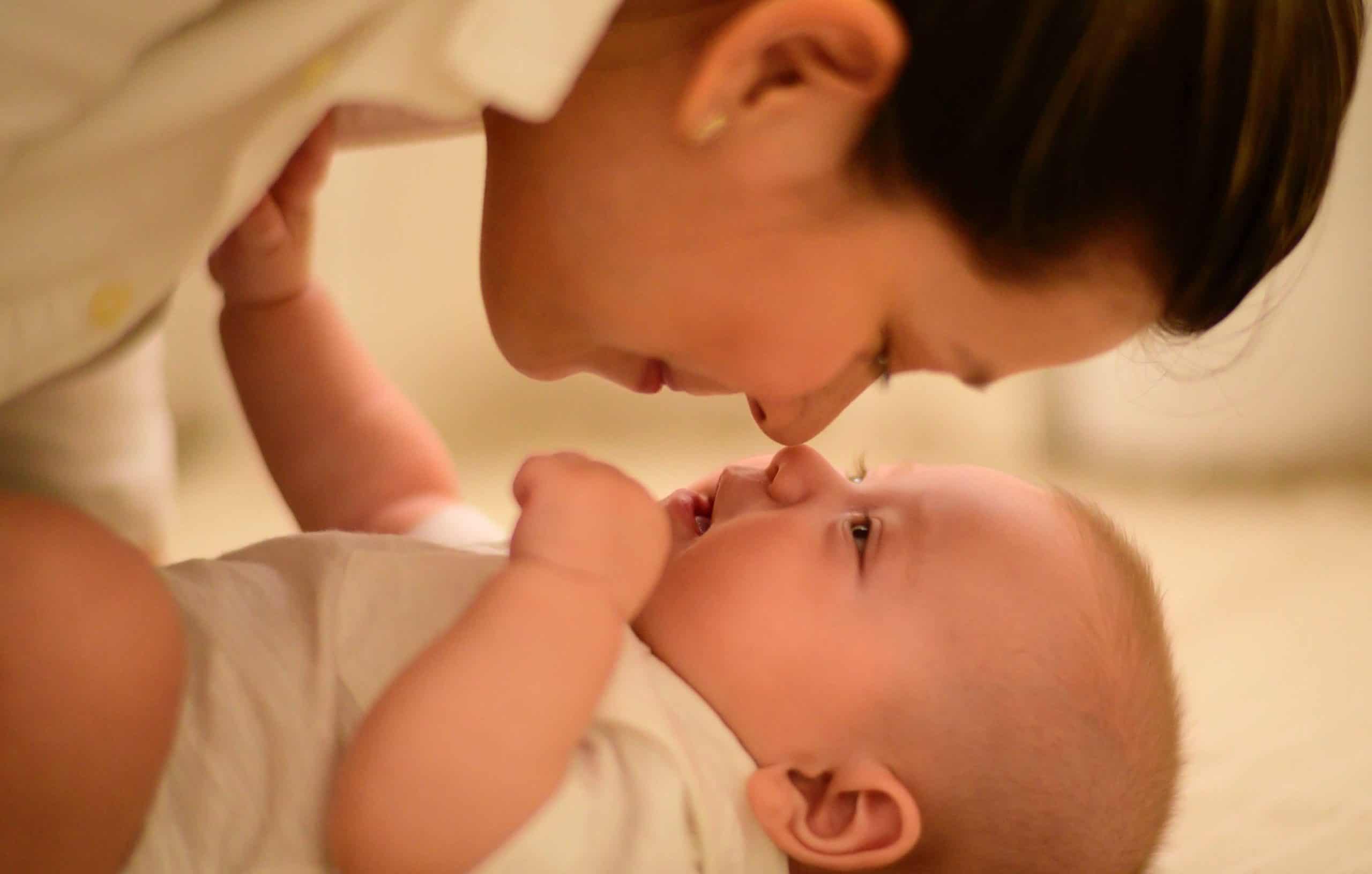 mom looking at baby seeing the value of humanness