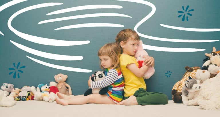 two kids fighting over stuffed animals