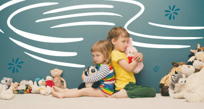 two kids fighting over stuffed animals