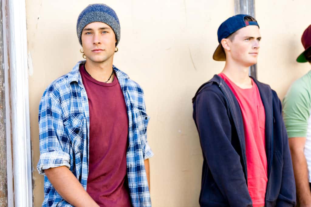 teens boys leaning on wall aged out of foster care
