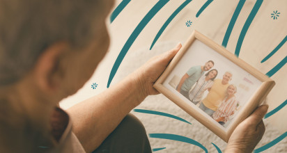 Parent looking at photo of prodigal child
