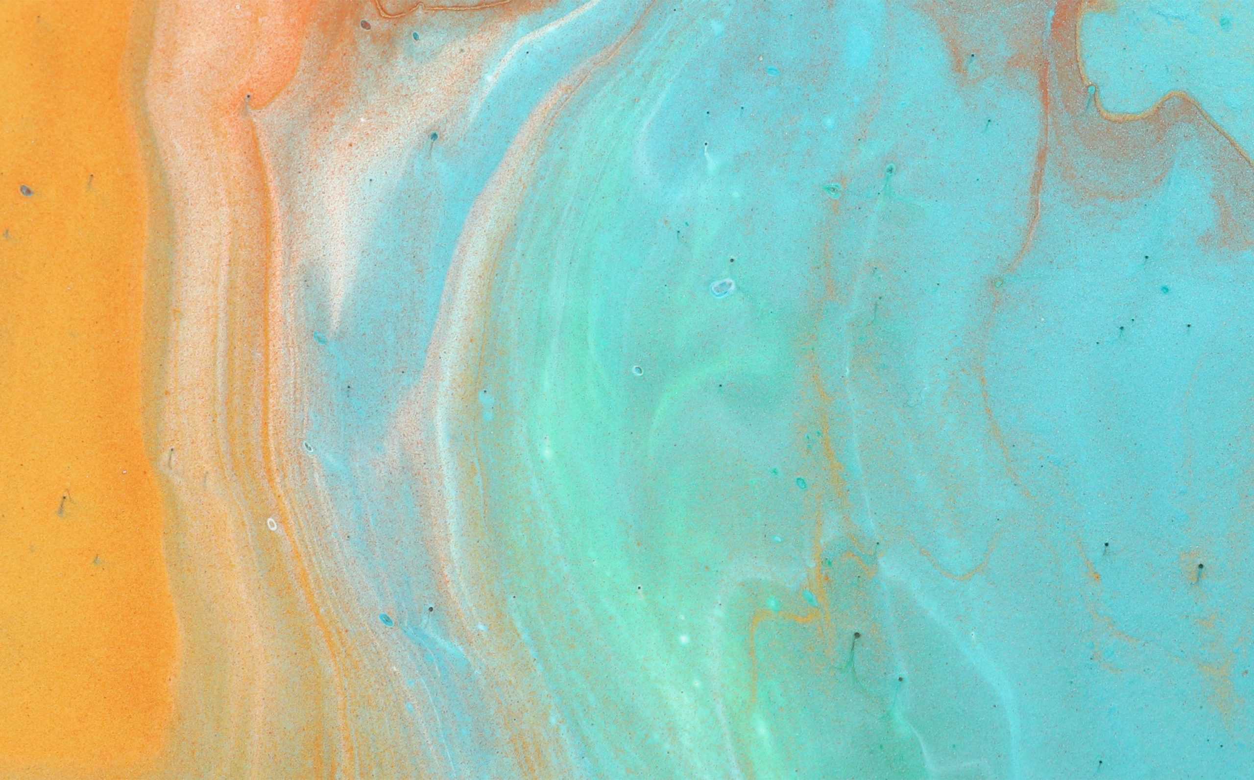 art photography of abstract marbleized effect background. Aqua, blue, gold and white creative colors