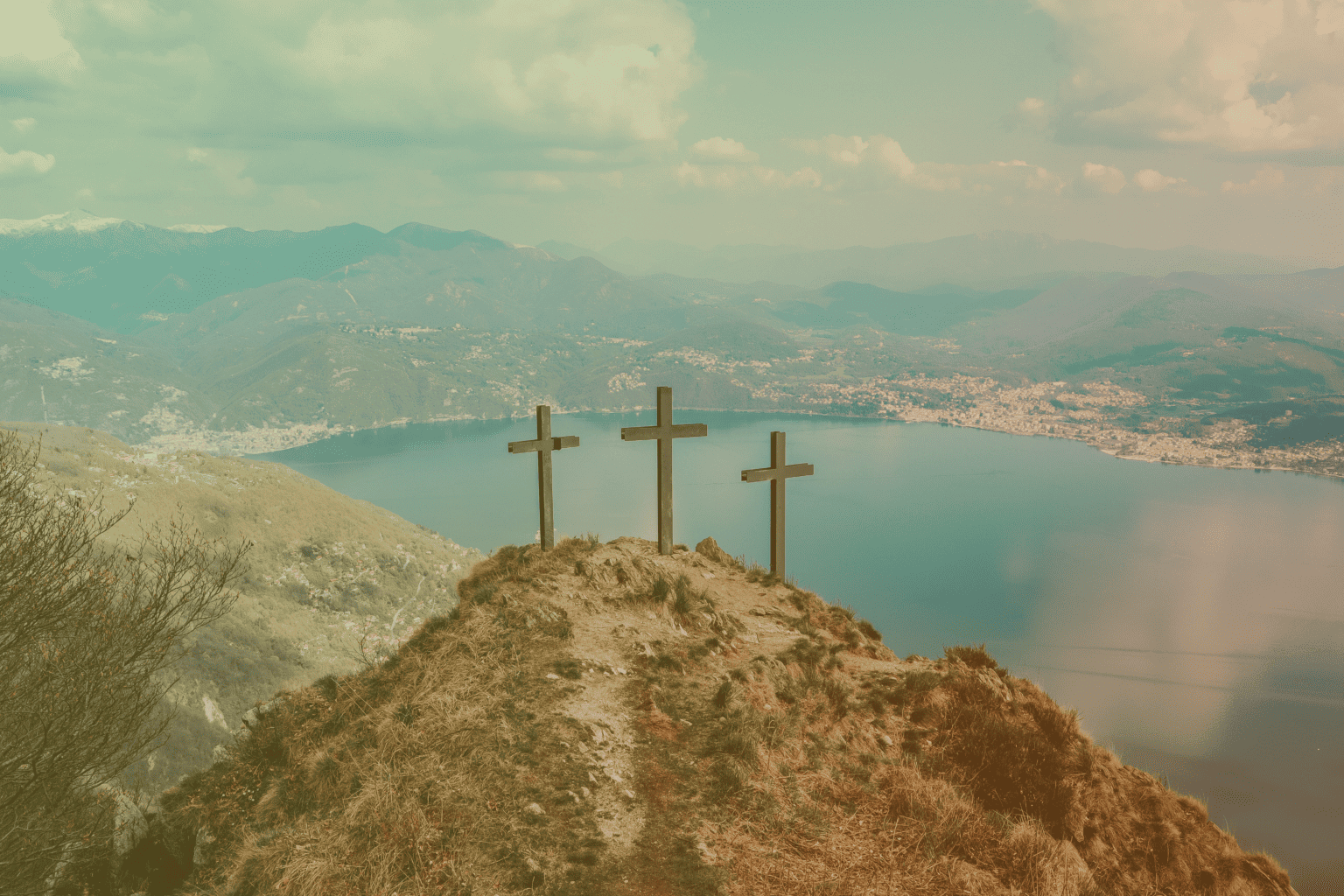 love like Jesus three crosses on a hill