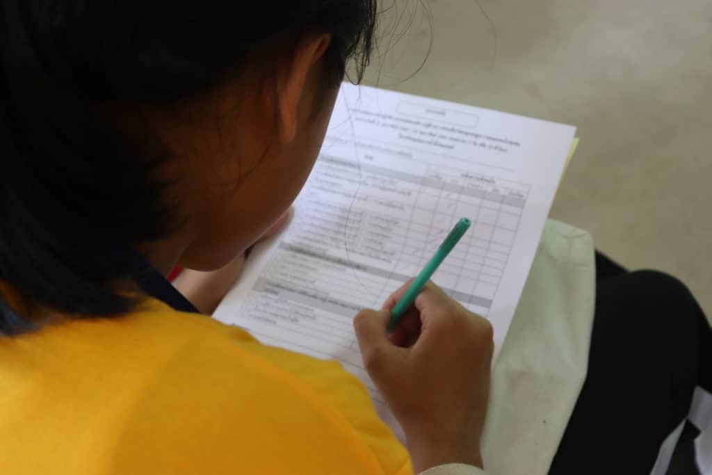 young girl taking ACE test