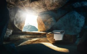 The crosses of Calvary viewed through the tomb.