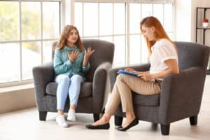 Caseworker with teen in foster care