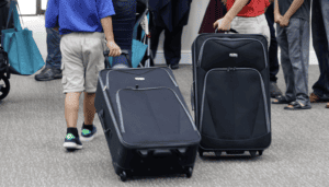 Children in foster care with their donated suitcases