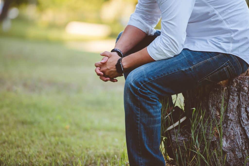 man praying in father's prayer