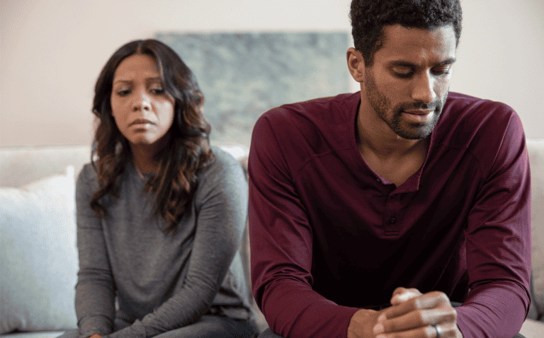 love is gone - a couple is turned away from each other