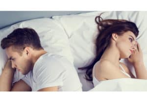 unhappy-couple-in-bed