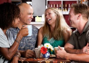 Two-married-couples-on-double-date-in-a-coffee-house