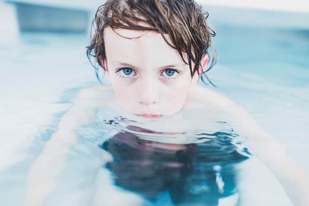 nervous looking child in pool
