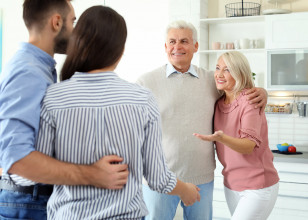 Young-couple-talking-with-in-laws