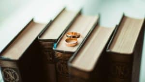 wedding rings on marriage books