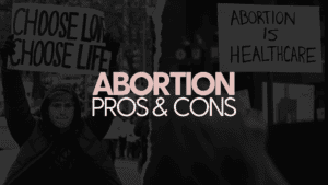 Image of people holding posters talking about human rights and abortion pros and cons