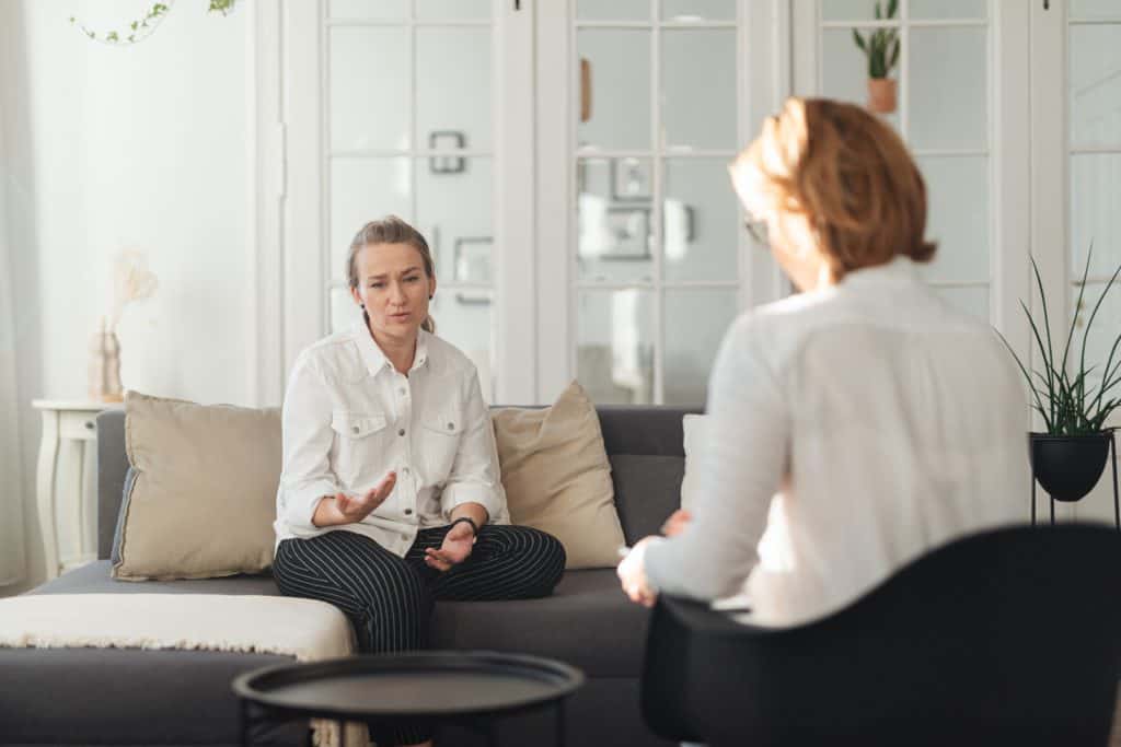 a counselor and client talking