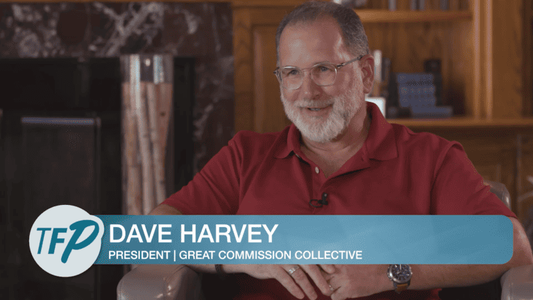Reverend Dave Harvey sits in an interview with the focused pastor