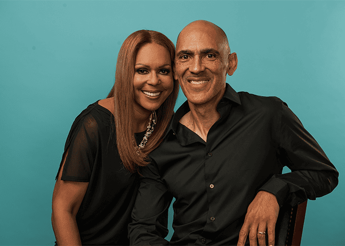 Lauren-and-Tony-Dungy-smiling-sitting-together