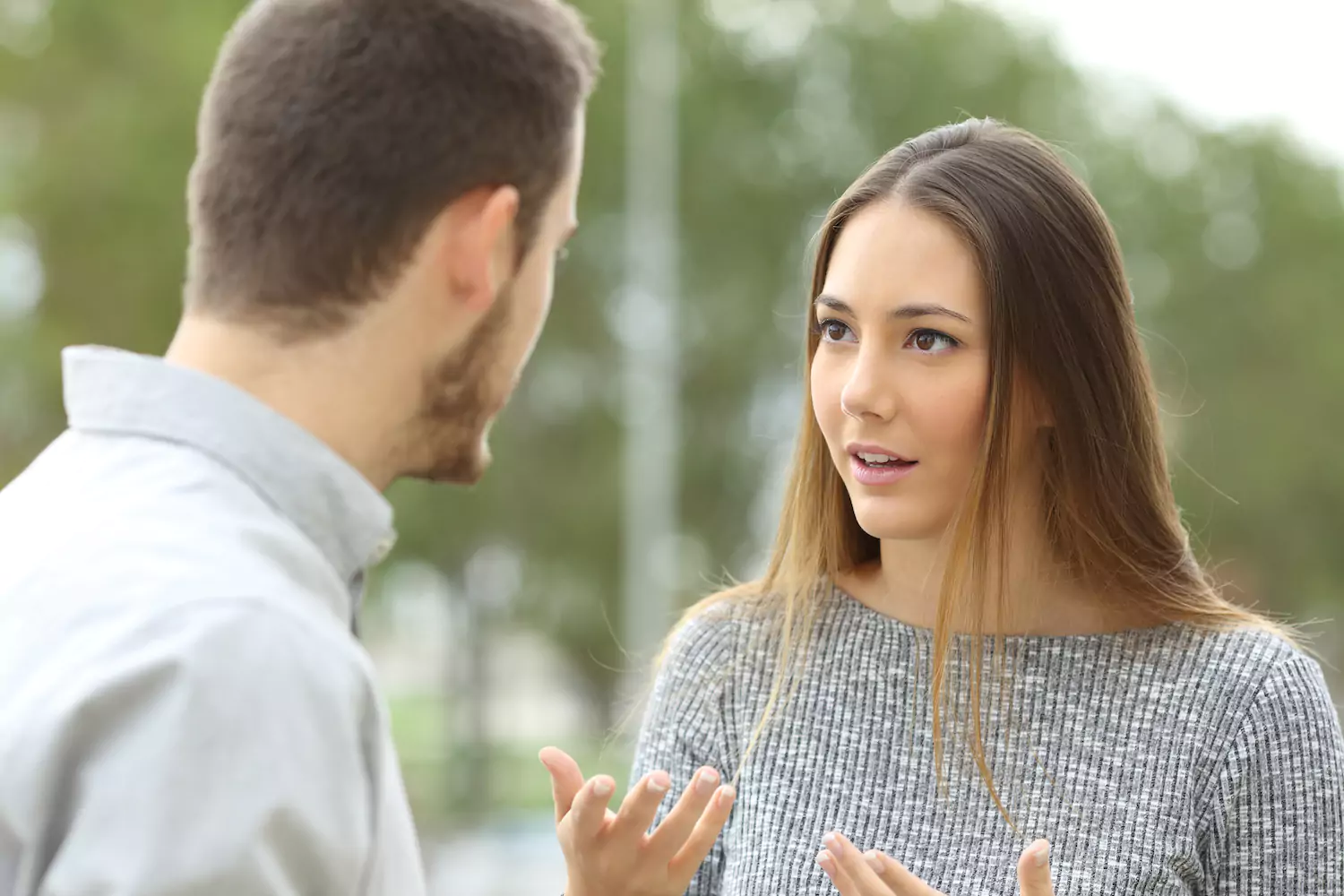 A young couple discussing a crisis or an issue they're having.