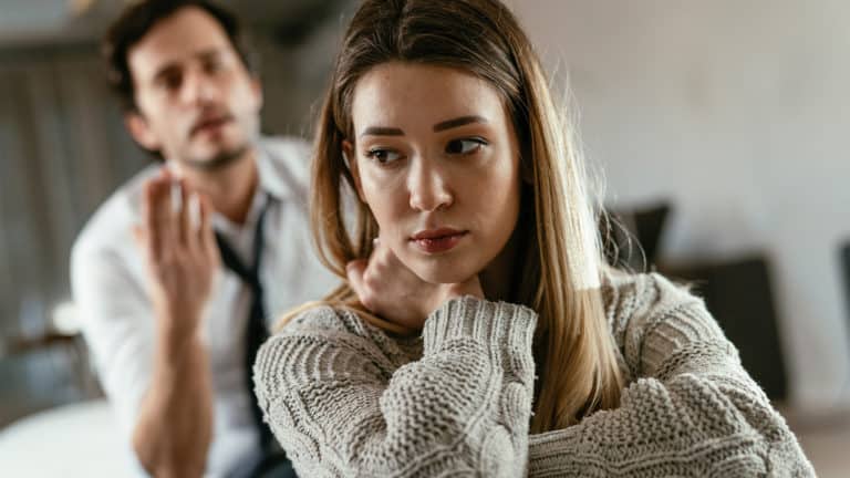 Depressed-wife-turned-away-from-husband-berating-her