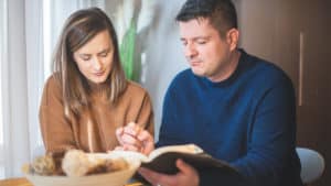 Couple-praying-together-at-home