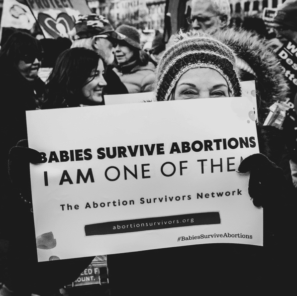 pro life signs about abortion survivors at march for life
